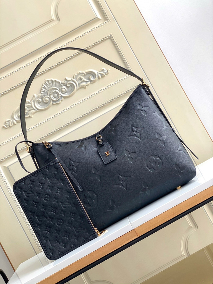 Louis Vuitton CarryAll MM Handbag Monogram Embossed Leather In Black