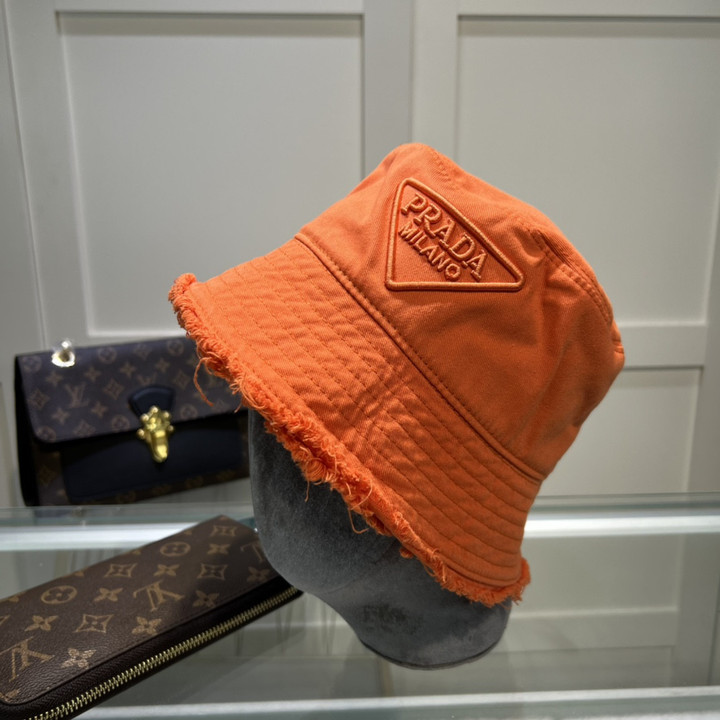 Prada Drill Bucket Hat With Fringed Edges In Orange