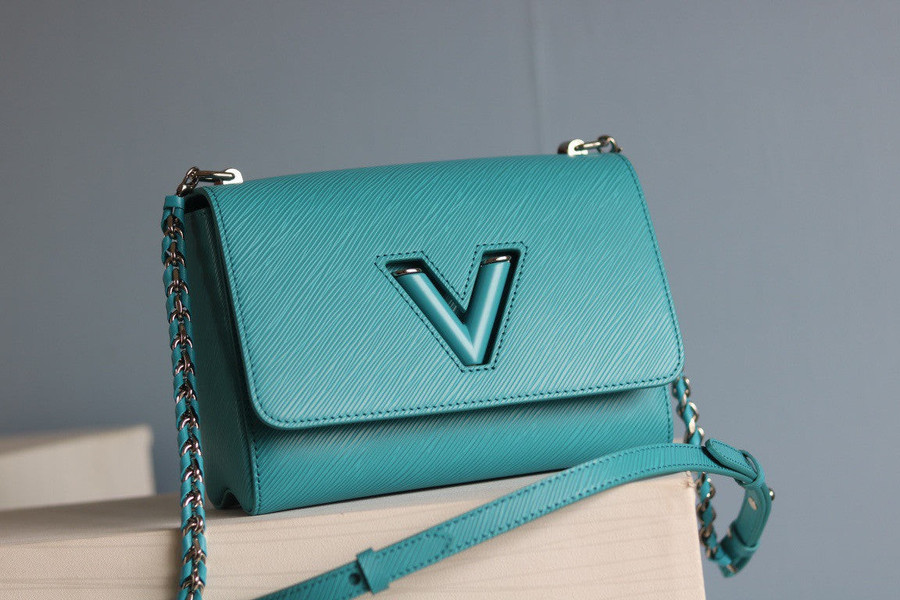 Louis Vuitton Turquoise Monogram Embossed Leather Pochette Coussin