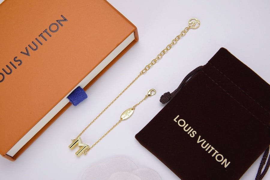 Louis Vuitton LV and Me Letter V Gold Tone Bracelet at 1stDibs