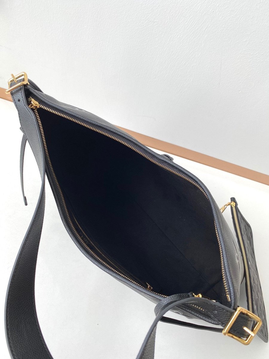 Louis Vuitton CarryAll MM Handbag Monogram Embossed Leather In