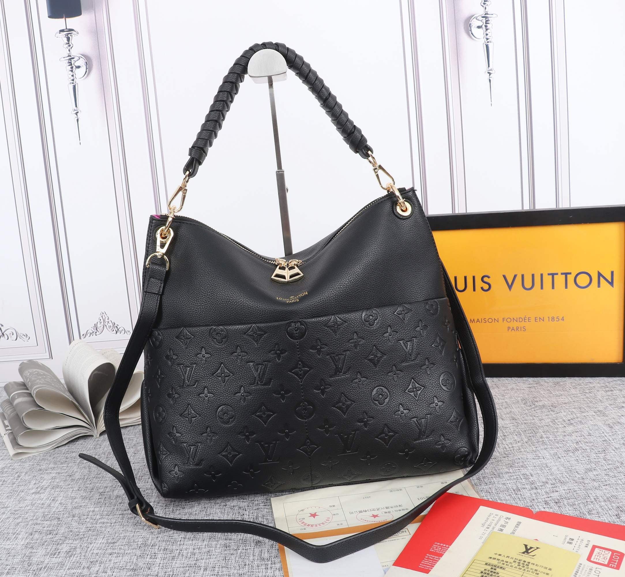 Louis Vuitton Maida Hobo Bag Monogram Empreinte Leather In Black