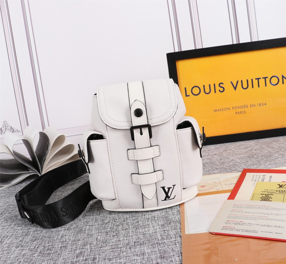 LOUIS VUITTON Taurillon Christopher Backpack XS White 943483