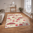 Red and tan mushroom print rug