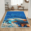 Sea turtle with tropical fish area rug