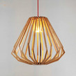This picture shows a simple wooden cone shape wood pendant lamp.
