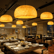This picture shows nine handmade bamboo vintage restaurant hanging lights in the restaurant.