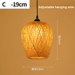 This picture shows a farmhouse handmade woven bamboo pendant lamp in size 26cm.