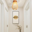 This picture shows a woven ceiling lamp in liveing room