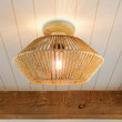 This picture shows a rattan ceiling lamp in doorway