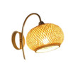 This picture shows a woven bamboo wall lamp 