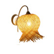 This picture shows a woven wall lamp