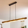 This picture shows a minimalist wood adjustable linear warm hanging lamp in the living room.
