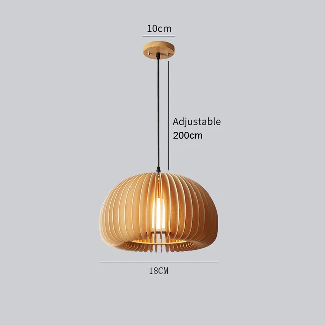 This picture shows a wooden pumpkin pendant light in 18cm size.