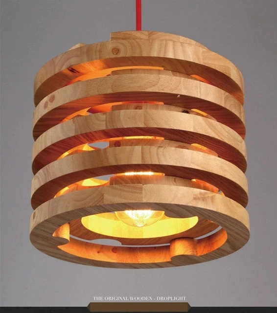 This picture shows a vintage solid wood pendant light in size 26cm.