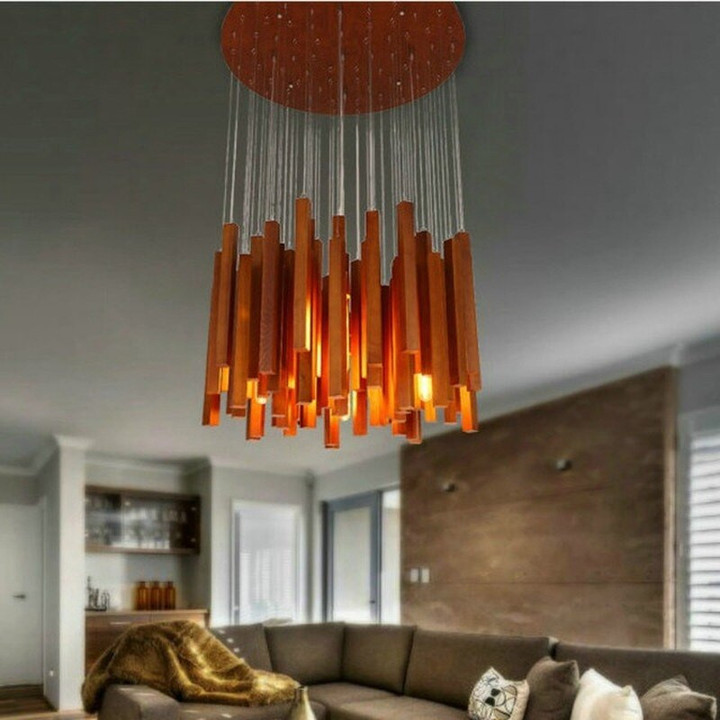 This picture shows a modern luxury novelty irregular wood pendant lamp in the bedroom.