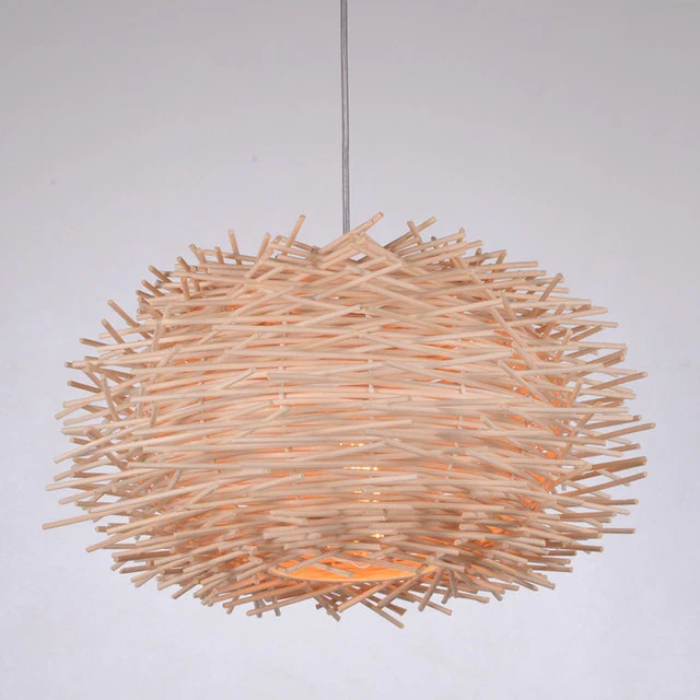 This picture shows a Nordic handmade rattan bird nest pendant light in wood color.