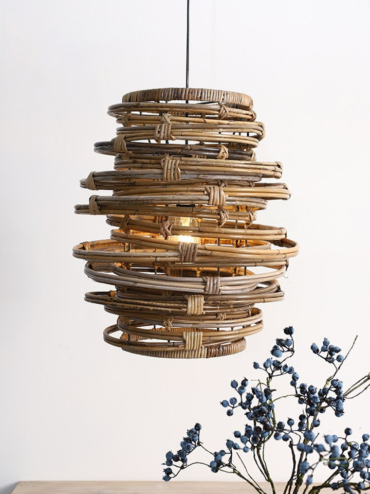 This picture shows a rattan vintage circle design hanging light in the living room.