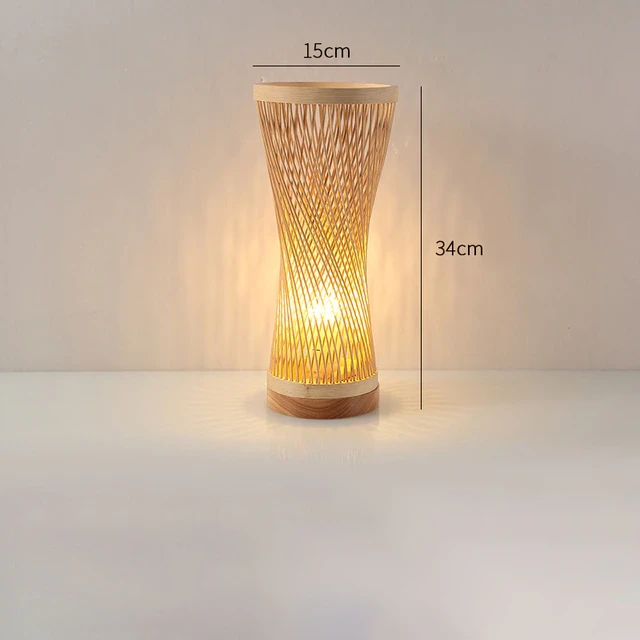 This picture shows a hand knitted weaving bamboo table lamp in size 34cm.