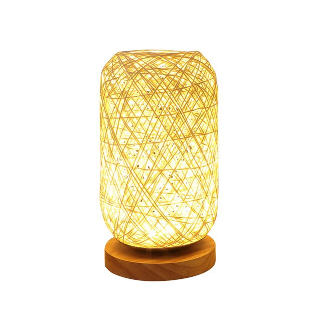 This picture shows a wood LED creative rattan bedside table lamp.