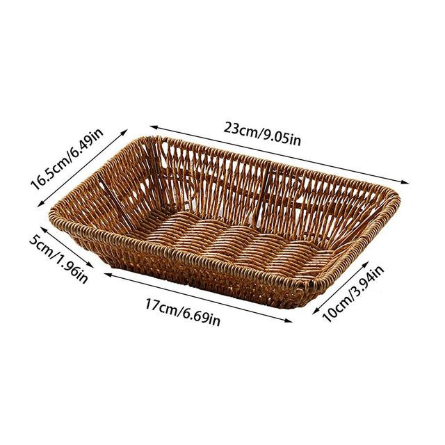 This picture shows a rectangle rattan woven serving tray basket for bread fruit in size 23cm.