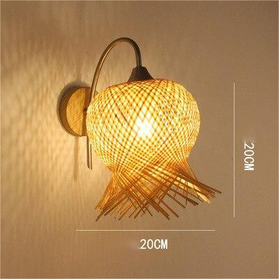 This picture shows a woven wall lamp in size 20cm