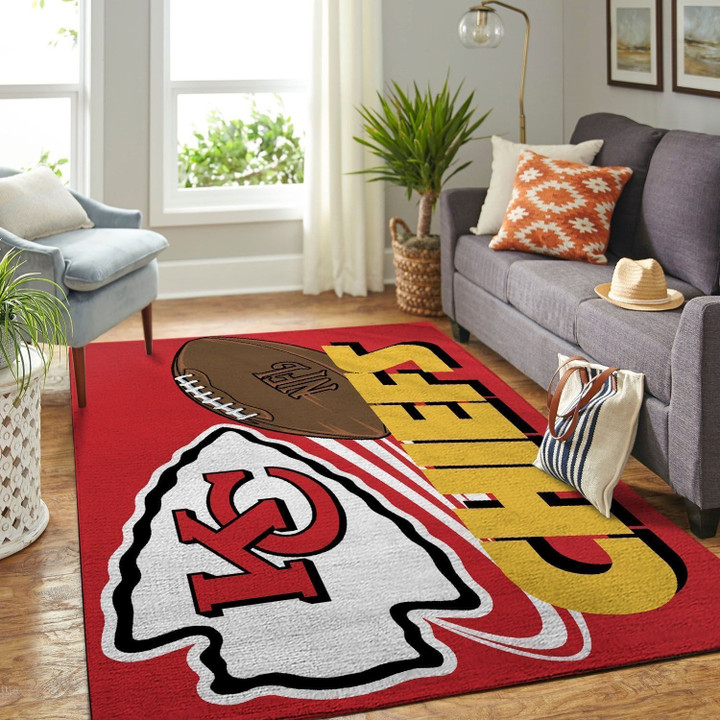 Ardent Fan Of Kansas City Chiefs With Living Room Parquet Rug.