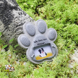 Pet Tombstone Creative Resin Memorial Stone, featuring a paw print design, engraved with a loving message for a cherished pet.