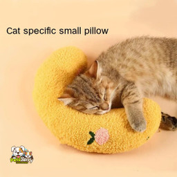Purrfect Slumber cat and puppy pillow with a relaxed cat sleeping on it.