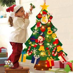 Child happily placing colorful felt ornaments on a Montessori Christmas Tree.