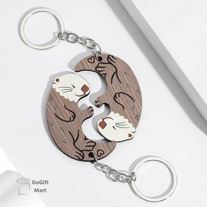 2 Piece Otter Embrace Wooden Keychain