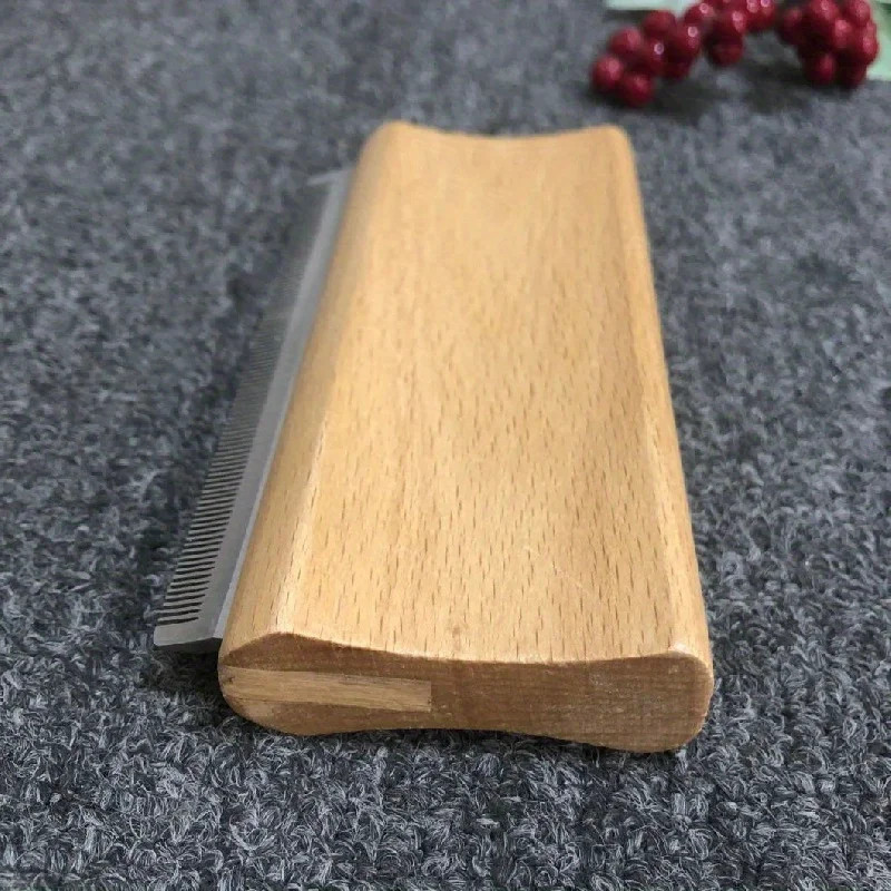 Close-up of micro-serrated deshedding blade removing loose undercoat fur from dog