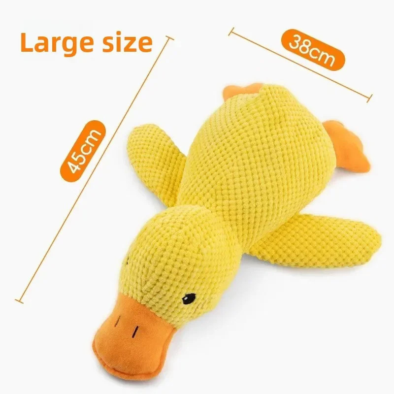 Dog chewing corn texture duck plush toy dental cleaning lifestyle