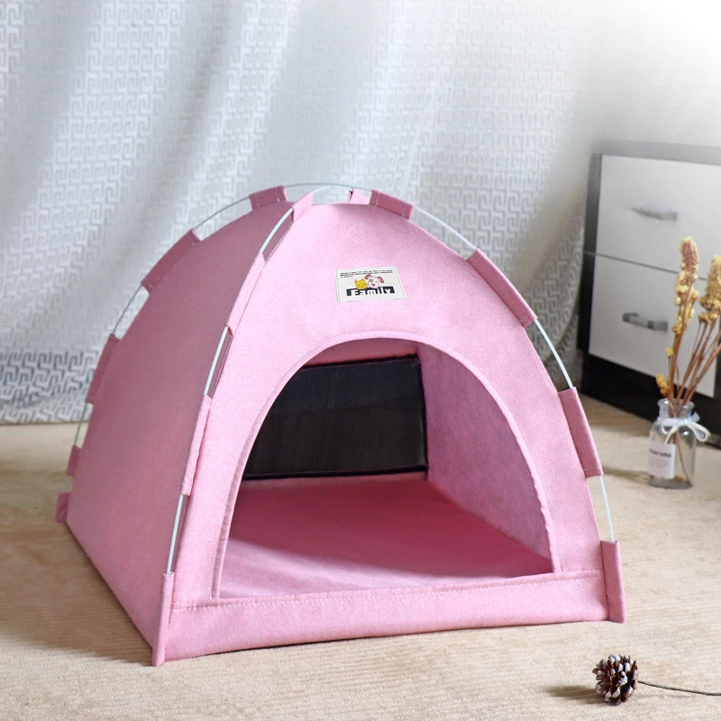 Small dog resting inside foldable breathable pet tent house portable cool mat outdoor use