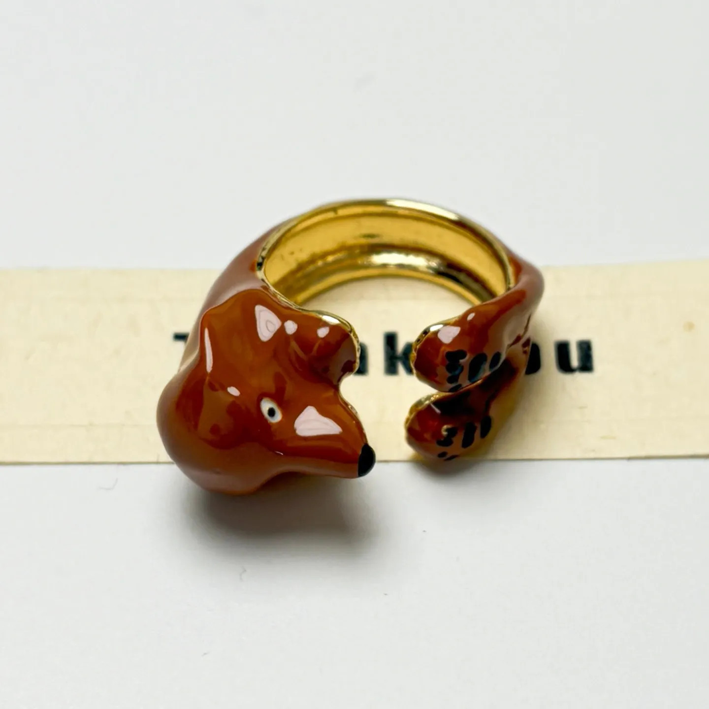 Luxury Dachshund hug ring displayed on a jewelry gift card Wigglelove