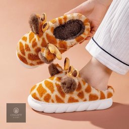 Stay cozy this winter with cute giraffe cartoon home slippers for men and women. Featuring thick soles, a warm design, and non-slip bottoms, these comfy indoor shoes are perfect for relaxing at home or gifting to someone special.