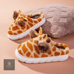 Stay cozy this winter with cute giraffe cartoon home slippers for men and women. Featuring thick soles, a warm design, and non-slip bottoms, these comfy indoor shoes are perfect for relaxing at home or gifting to someone special.