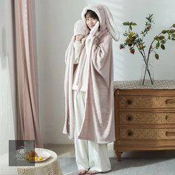 Stay warm and cozy with this Kawaii Wearable Rabbit Blanket! Made with soft coral velvet, this cute Japanese-style hooded throw is perfect for adults and kids. A lovely winter essential and adorable gift for rabbit lovers.