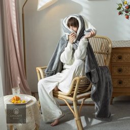 Stay warm and cozy with this Kawaii Wearable Rabbit Blanket! Made with soft coral velvet, this cute Japanese-style hooded throw is perfect for adults and kids. A lovely winter essential and adorable gift for rabbit lovers.