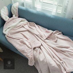 Stay warm and cozy with this Kawaii Wearable Rabbit Blanket! Made with soft coral velvet, this cute Japanese-style hooded throw is perfect for adults and kids. A lovely winter essential and adorable gift for rabbit lovers.