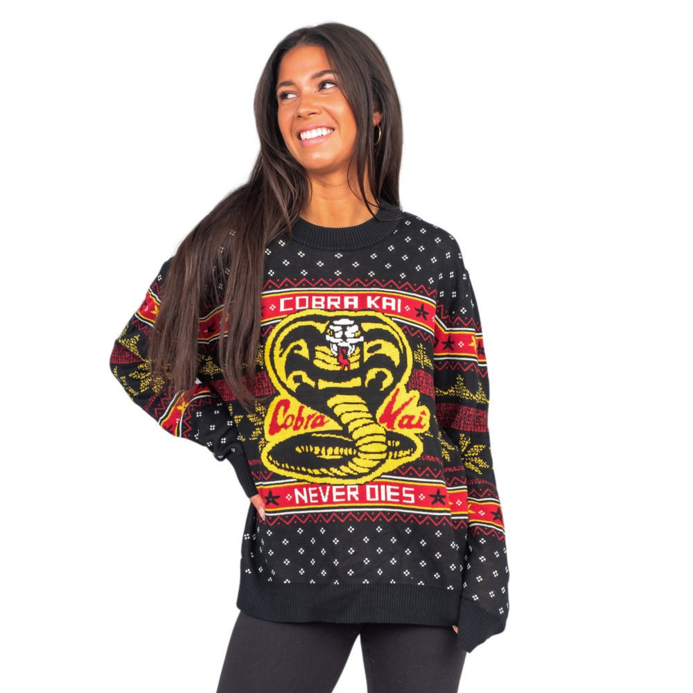 Top Gun G Force Ugly Christmas Sweater  Take your holiday style to supersonic heights with the Top Gun G Force Ugly Christmas Sweater. Featuring fighter jet-inspired graphics and nods to the classic Top Gun film, this sweater combines high-flying nostalgia with festive patterns for fans who love action-packed holidays.  Why This Top Gun Sweater?  Iconic Movie Tribute Show off your love for Top Gun with G-Force themed designs and aviation-inspired graphics, perfect for any aviation or movie enthusiast.  Festive Meets Action Holiday patterns meet fighter jet motifs for a sweater that stands out in ugly sweater contests, family gatherings, or themed parties.  Perfect for Movie Fans Whether gifting to a Top Gun fan or wearing it yourself, this sweater delivers nostalgia, humor, and festive flair.  Comfortable & Durable Made from a soft, premium knit, it keeps you warm while letting your love for action-packed adventures shine.  Product Details  Material: Premium knitted fabric for warmth and durability  Fit: Unisex regular fit, perfect for layering  Graphic: Fighter jet and G-Force inspired holiday design  Colors: Festive red, green, white, and black tones  Sizes: S–XXL  Celebrate the season in high-flying style with the Top Gun G Force Ugly Christmas Sweater — festive, nostalgic, and action-packed.