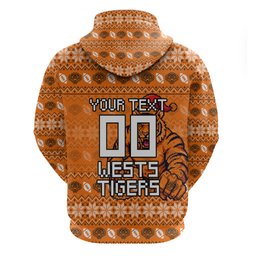 Personalized Wests Tigers Christmas Zip Hoodie Australian Rugby Fans - Pixelated Ugly Xmas Pattern Mascot Santa
