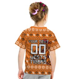 Personalized Wests Tigers Christmas Kid T Shirt Australian Rugby Fans - Pixelated Ugly Xmas Pattern Mascot Santa