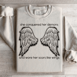 She Conquered Her Demons And Wore Her Scars Like Wings Sweatshirt