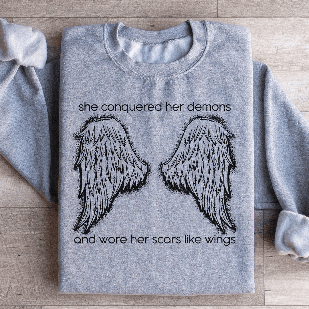 She Conquered Her Demons And Wore Her Scars Like Wings Sweatshirt