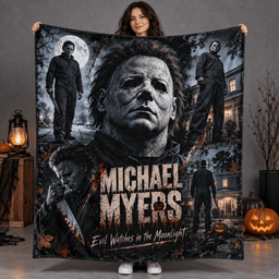Michael Myers Pale Mask And Moonlit House Fleece Blanket For A Halloween Horror Marathon NDN Person Holding Blanket