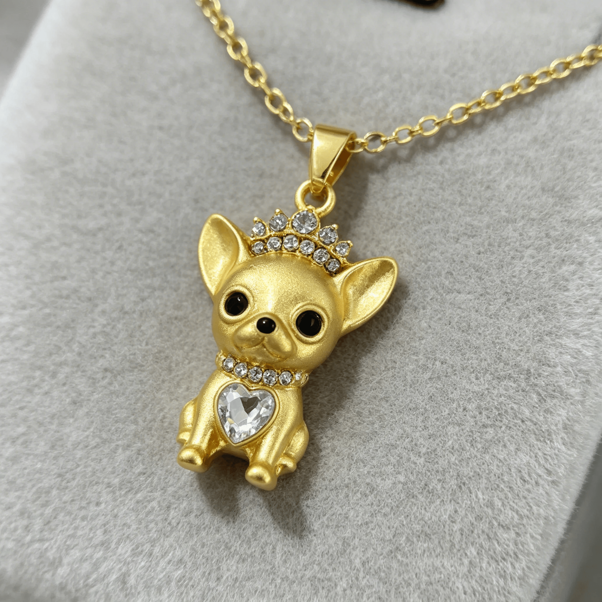 3D sitting Chihuahua pendant with crystal crown and heart centrepiece on gold tone chain