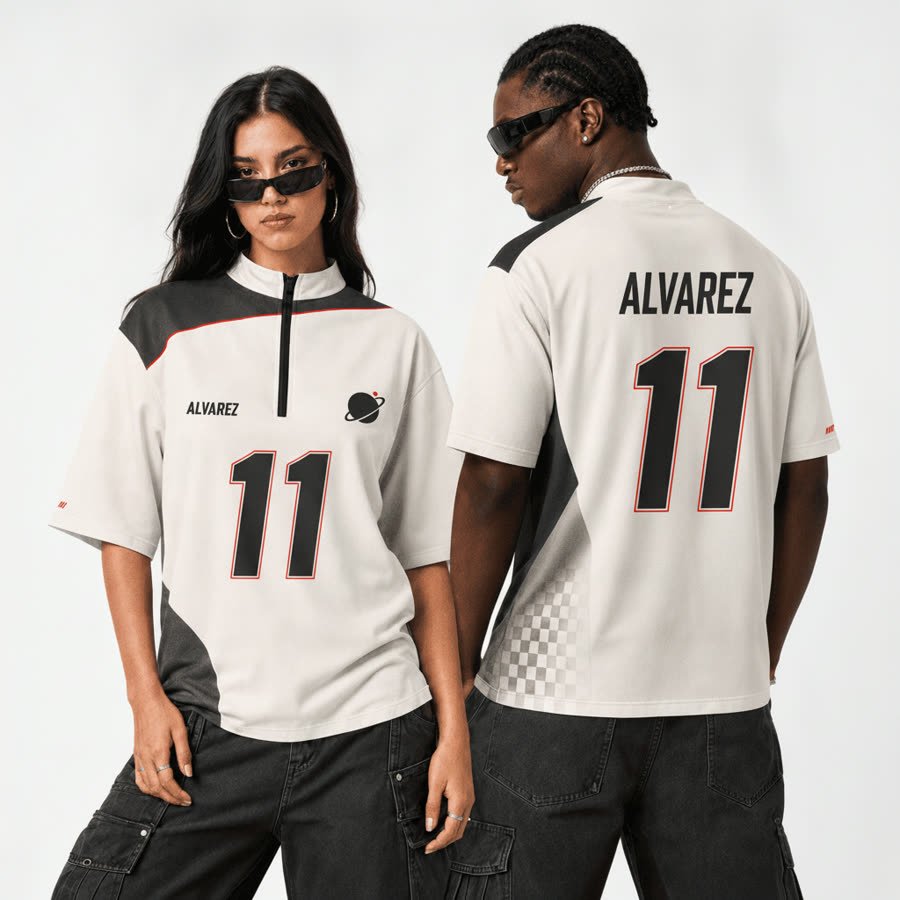 Example custom quarter zip jersey in off-white and charcoal with the name Alvarez and number 11 printed front and back
