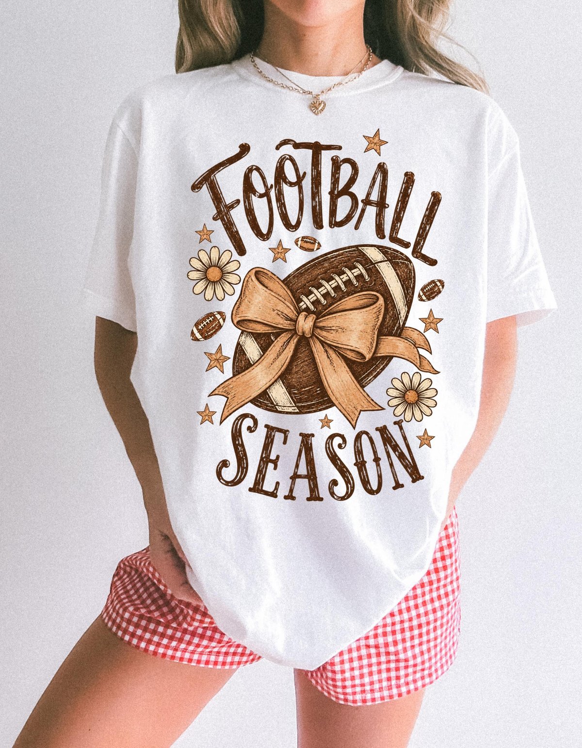Football season bow graphic T-shirt