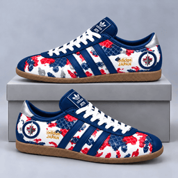 Winnipeg Jets | Premium NHL Lightning Japan Low Top Sneakers with Ice Camo Pattern and Classic Gum Sole NDN cover